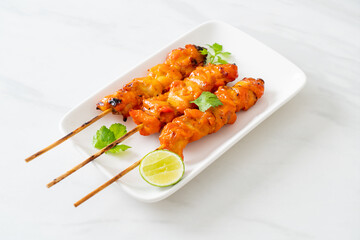 grilled chicken skewer with herbs and spices