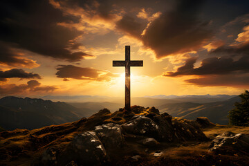 Cross stand on the rock on top of the Hill with sunset dramatic sky and sunlight on the background, for copy space, wallpaper, backdrop - obrazy, fototapety, plakaty