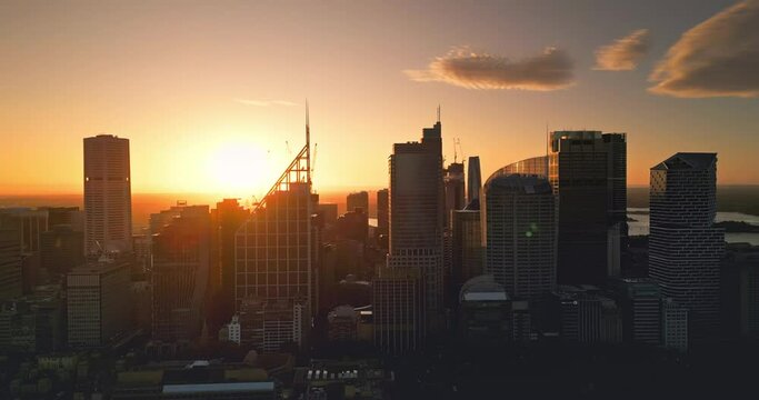 4K Aerial view Real time Footage of Sydney City various building in Central Business District when sunrise time with airplane, Sydney, New South Wales, Australia, Business financial and Travel