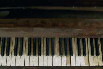 Old dirty piano keys in an abandoned church.  Bay of Plenty, New Zealand.