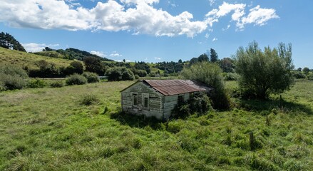 Abandoned farm shed. Kutarere, Ōpōtiki, Bay of Plenty, New Zealand. - obrazy, fototapety, plakaty