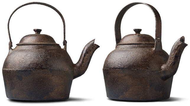 set of cast iron kettles with rough surface, classic vessel used for boiling water and brewing tea, durable with heat retention properties taken in different angles and isolated on white background