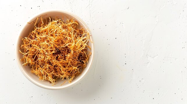 Dried golden sea moss over a white wooden bowl with a white backdrop along with nutritious value and space, Generative AI.