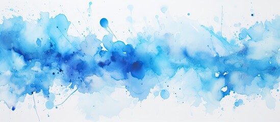 An artwork featuring splashes of blue watercolor paint on a clean white surface