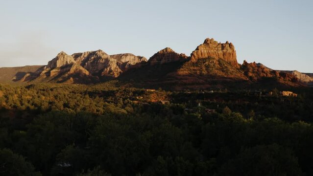 Golden hour sunrise hitting Snoopy Rock in Sedona, Arizona.
