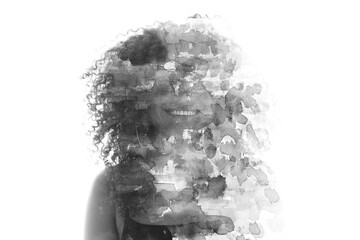 A black and white double exposure paintography portrait of a smiling woman