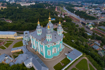 Above the ancient Cathedral of the Assumption of the Blessed Virgin Mary on a July morning. Smolensk, Russia - 766096467