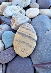 Interesting rocks at a sea coast, beach coastline, natural texture and structures