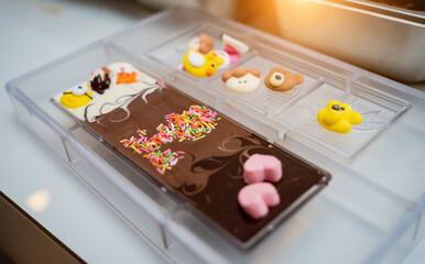 Ingredients for making handmade chocolates and candies in a workshop