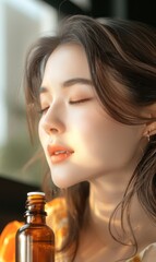 Portrait of a young asian girl smelling perfume from the bottle she is holding.