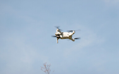 Remotely controlled drone with camera system in full operation