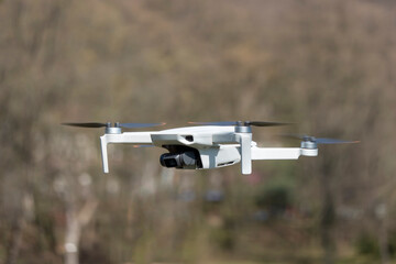 Remotely controlled drone with camera system in full operation