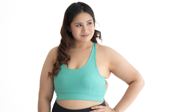 Portrait sporty chubby woman wearing exercise clothes
