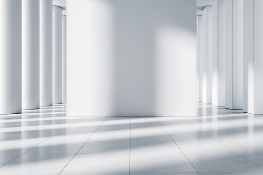 A minimalist white gallery space with columns, light and shadows on the floor, modern design. 3D Rendering