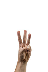 A man's hand raised up shows the number three.