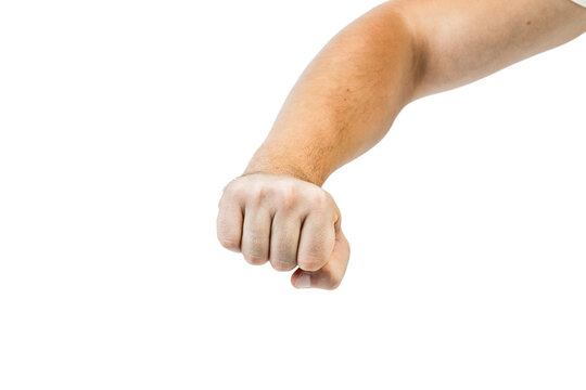 A man's hand with a fist.