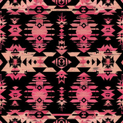 A black and pink patterned fabric with a Native American design