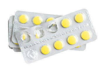 Yellow medicine pills in a blister pack isolated on transparent background, healthcare and medicine concept, top view