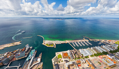 Helsingborg, Sweden. Panorama of the city in summer with port infrastructure. Oresund Strait....