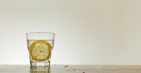 Water Glass with a lemon slice - 766165080