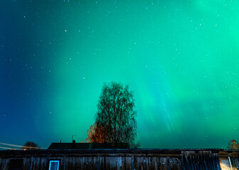 colorful northern lights, view from the window, northern lights in spring