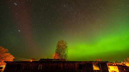 colorful northern lights, view from the window, northern lights in spring