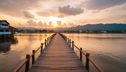Fototapeta na wymiar pier and river landscape view at sunset in kampot town cambodia