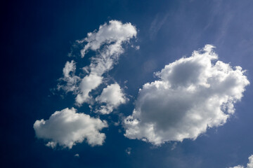  Beautiful sky view. White clouds on a blue background.