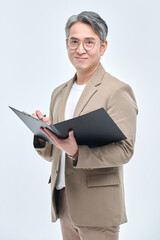 A middle-aged man in a suit and glasses is holding a document file and posing with a variety of confident expressions.