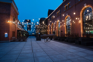 An old factory renovated and transformed into shopping mall in Warsaw, Poland on a early spring evening