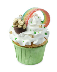 St. Patrick's day party. Tasty cupcake with sour rainbow belt and pot of gold toppers isolated on white