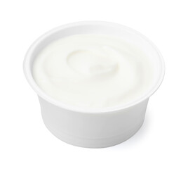 Delicious natural yogurt in plastic cup isolated on white