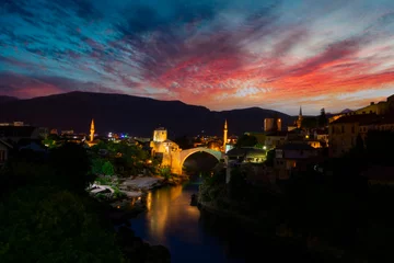 Papier Peint photo Stari Most Mostar, Bosnia and Herzegovina. The Old Bridge, Stari Most, with emerald river Neretva.