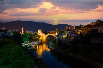 Fotobehang Stari Most Mostar, Bosnia and Herzegovina. The Old Bridge, Stari Most, with emerald river Neretva.