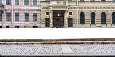 Long horizontal blank billboard above street level with classic architectural elements and...