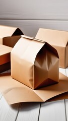 A stack of brown cardboard boxes with a white background. The boxes are tied with string and appear to be waiting to be shipped. Ecology theme. Eco-friendly dishes.