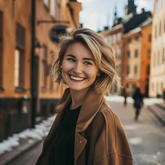 Möbelaufkleber Portrait of beautiful blonde scandinavian  woman model on the street of  Stockholm  © Bogna