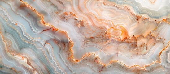 Closeup shot of a swirl patterned marble texture, resembling a landscape art piece. The intricate pattern resembles a peach swirl, making it a unique ingredient for any dish or recipe