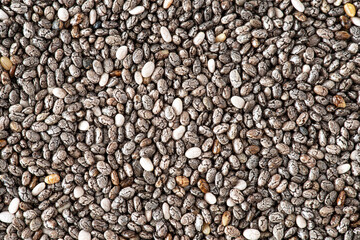 Texture of grey chia seeds seen from the side