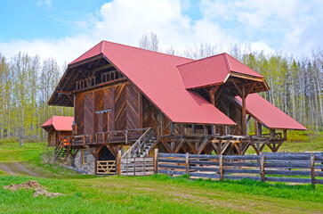 Modern wooden barn with red roof, Canada