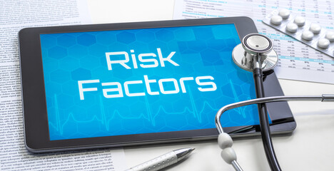 A tablet with the word Risk Factors on the display