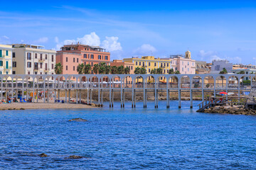 Cityscape of Civitavecchia in Italy: view of Pirgo beach with its pedestrian bridge.	 - obrazy, fototapety, plakaty