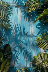 a wooden surface, surrounded by green tropical leaves, against a blue background, copy space