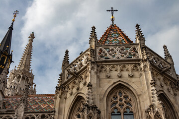 Famous historic Matthias Church in Budapest, Hungary, a must-visit landmark. Gothic architectural and decorative colorful powerful style, Catholic church with neo-Gothic style, built in 1255