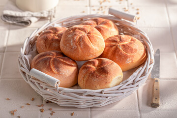 Hot and golden kaiser rolls for perfect and healthy breakfast. - 766306636