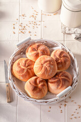 Hot and golden kaiser buns baked in a bakehouse. - 766306839