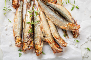 Fresh and salty smoked sprats marinated with salt and spices. - 766307860