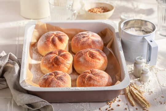 Tasty and homemade kaiser buns freshly baked in home bakery.