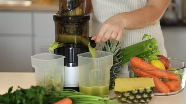 Middle selection of table with fruits and vegetable for fresh juice. Homemade beverage in juicer. Healthy concept 