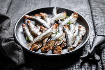 Healthy and fresh smoked sprats as popular mediterranean food. - 766311454